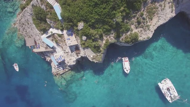 4K (UHD) Aerial view of  Agios Nikolaos blue caves  in Zakynthos (Zante) island, in Greece - Log