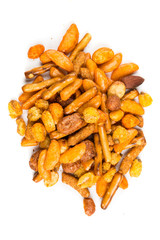 Pile of spiced crunch snack mix isolated on a white background