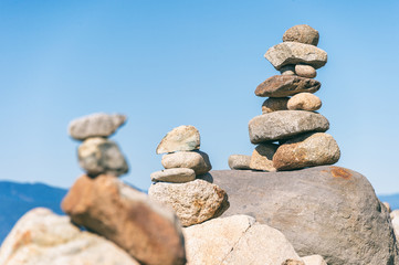 Fototapeta na wymiar Rock balancing in Vancouver stone stacking garden