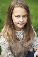 Fototapeta premium Portrait of a beautiful young little girl
