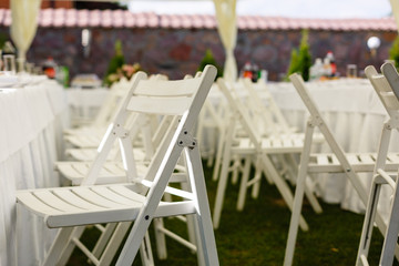 folding chairs at a wedding ceremony
