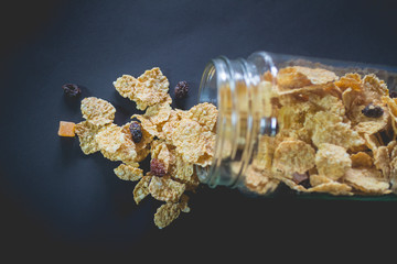 whole grain cereal flakes which mixed dried fruit and raisins