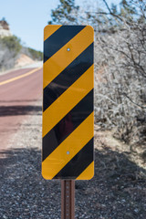 Caution Sign on Side of Road