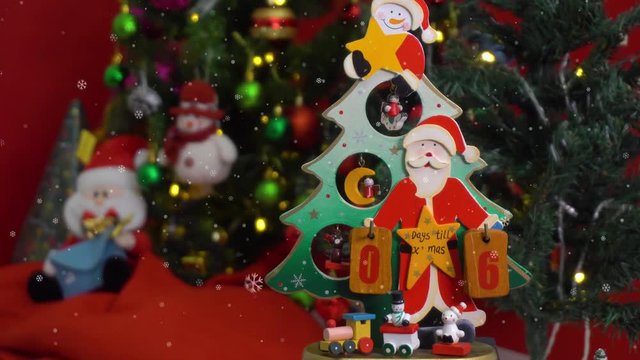 Greeting Season concept.Dolly of Santa Claus show 6 days till Xmas with ornaments on a Christmas tree with decorative light in 4k (UHD)