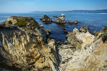 Fototapeta na wymiar Carmel Pacific Sea Shore with Rock and blue sky