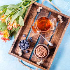 Image of cake with blueberries, cup