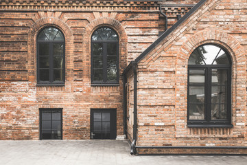 One storey red brick office building with multiple windows, Kaunas, Lithuania