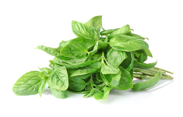 Pile of green fresh organic basil leaves isolated on white