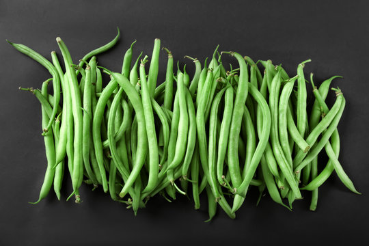 Fresh green beans on dark background