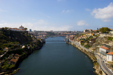 Fototapeta na wymiar View of the landmark Luis Bridge in Porto, Portugal during the day