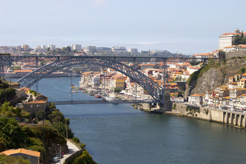 Fototapeta premium View of the landmark Luis Bridge in Porto, Portugal during the day