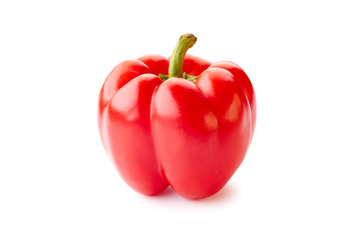 Ripe red bell pepper over white