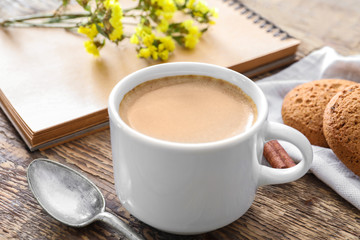 Obraz na płótnie Canvas Cup of aromatic morning coffee on table