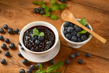 homemade blueberry jam with fruits around