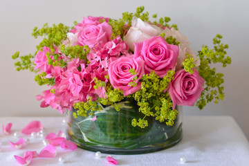 floral composition with a pink roses