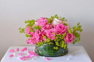 floral composition with a pink roses