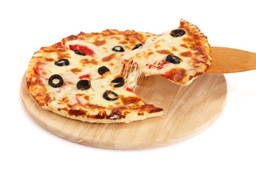 pizza with black olives on a wooden board isolated on white background