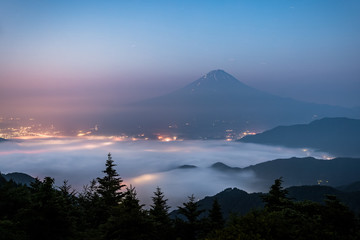 Fototapeta na wymiar Mt.Fuji with sea of mist above Kawaguchiko lake in summer