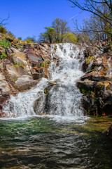 Waterfall in deep rain forest