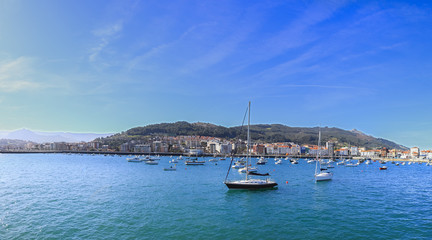 Obraz premium Panoramic view of Castro Urdiales, coastal town located in Cantabria with Harbour and castle, Spain