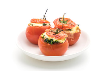  baked tomatoes stuffed with cheese and spinach