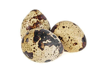 Group of quail eggs isolated on a white background