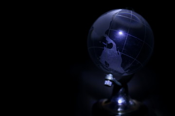 Globe 9 - Glass globe in lowlight