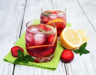 Glasses of lemonade with strawberries