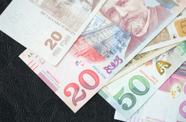 Some banknotes of Georgian lari on a dark background