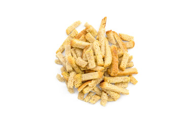 Heap of bread croutons to beer on a white background. Top view.