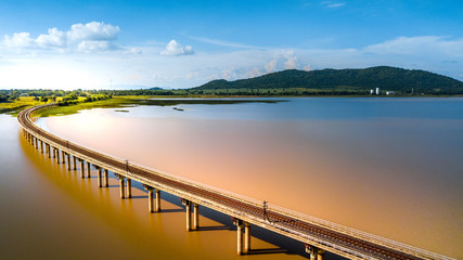 Aerial Photo Railway Curve Track to the mountains is located on the River Pasak River Dam,Lopburi Thailand