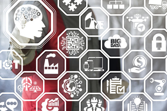 Thinking Industrial concept. Engineer touched pen of head brain icon on a virtual interface. Artificial Intelligence Smart manufacturing 4.0. Mind Information Technologies Production.