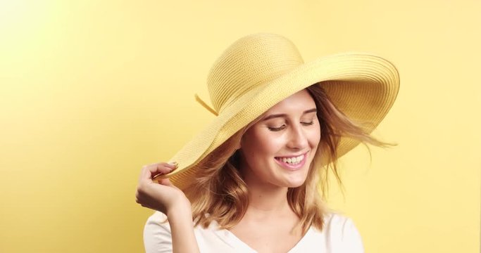 Smiling blonde woman wearing hat video