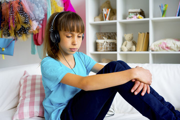 Teen girl listening to music