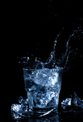 ice cube in the glass of water