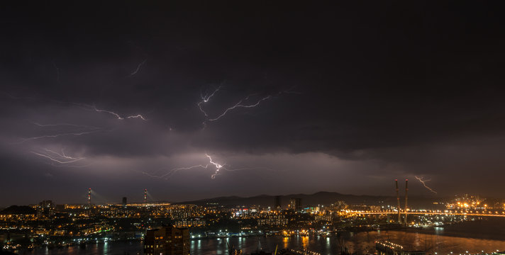 Lightning storm over city.