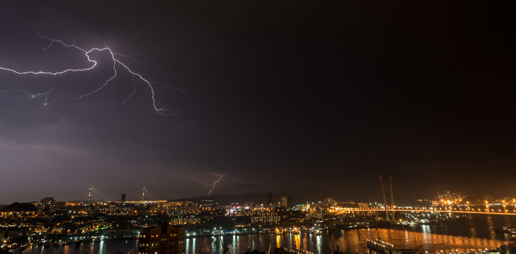 Lightning storm over city.