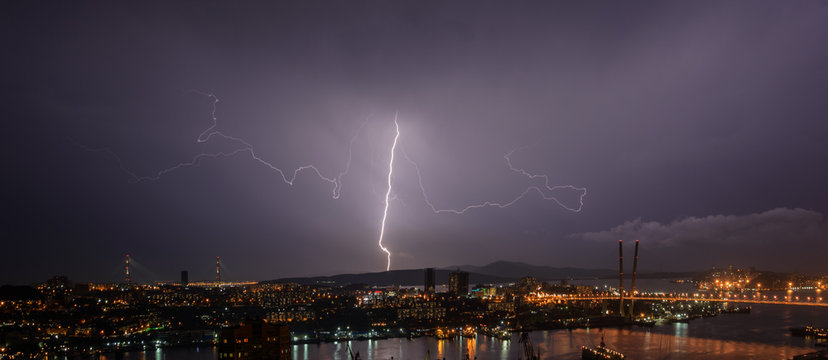 Lightning storm over city.