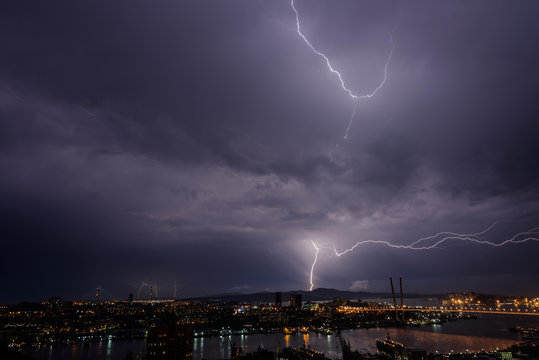 Lightning storm over city.