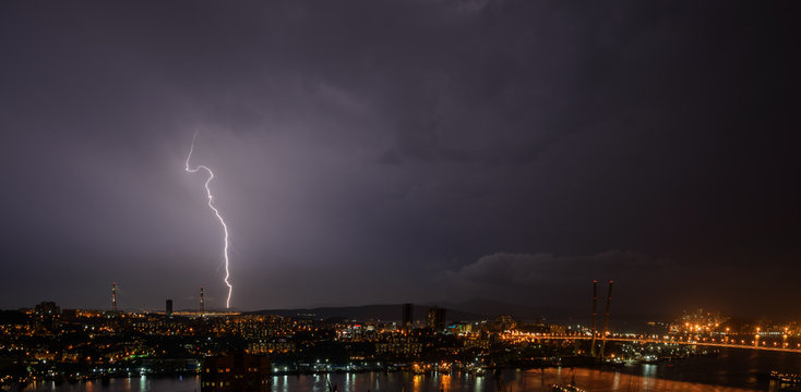 Lightning storm over city.