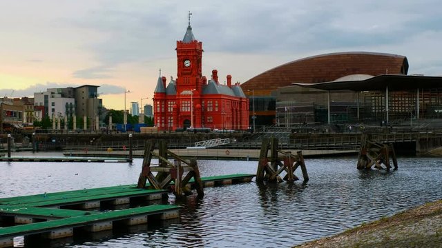 Cardiff, UK. Waterfront at night in Cardiff, UK. Sunset colorful sky with Wales Millennium Center at Cardiff Bay at sunset