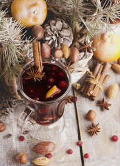 Cup of hot wine Christmas card with fir-tree branches