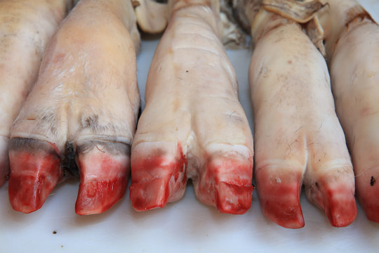 Pigs Trotters on Street Market in Catania. Sicily