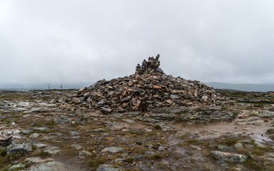 pile of rocks in top of the hill