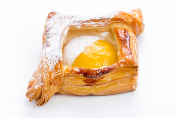Open pies of puff pastry with peach, thyme and honey. Breakfast. Selective focus