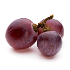 Ripe red grape isolated on white.