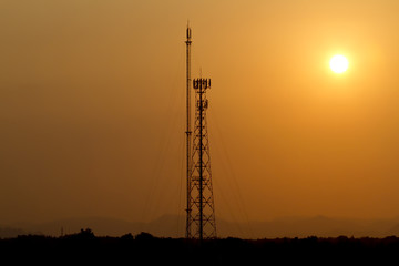 Fototapeta premium Silhouetted Antennas in the sunset