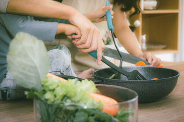 Close up Families are cooking together in the kitchen.