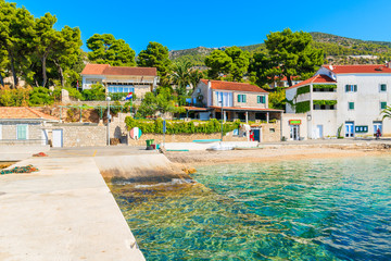 Houses in Bol port with beautiful coast view, Brac island, Croatia