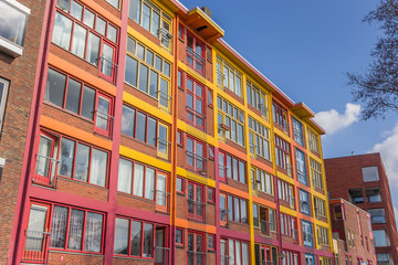 Fototapeta na wymiar Colorful apartment building in a former warehouse in Groningen